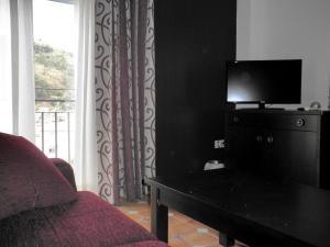 TV a/nebo společenská místnost v ubytování Alcaidia De Magina