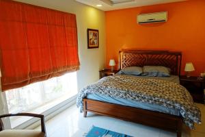 Uma cama ou camas num quarto em Morgah Resort - Guest Rooms