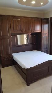 A bed or beds in a room at Luxury penthouse with sea view