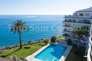 a view of the ocean from the balcony of a building at Acapulco playa Nerja 407 planta superior in Nerja