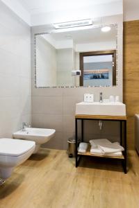 Kúpeľňa v ubytovaní Hotel CONRAD Comfort