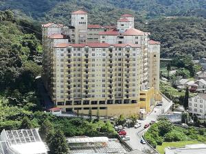an aerial view of a large building in a city at Mag Homestay at Crown Imperial Court, Brinchang in Cameron Highlands