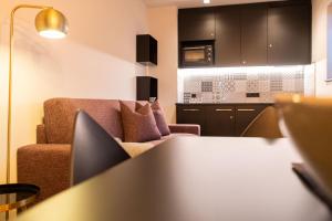 Kuchyň nebo kuchyňský kout v ubytování Burgus - Design Suites & Apartments