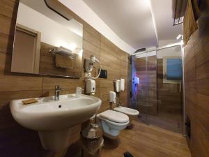 Koupelna v ubytování Hotel Casale dei Greci