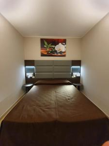 Postel nebo postele na pokoji v ubytování Hotel Casale dei Greci