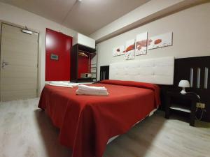 Postel nebo postele na pokoji v ubytování Hotel Casale dei Greci