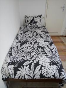 Ένα ή περισσότερα κρεβάτια σε δωμάτιο στο Le Yanis