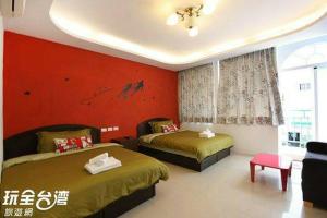 Letto o letti in una camera di Nandian Homestay