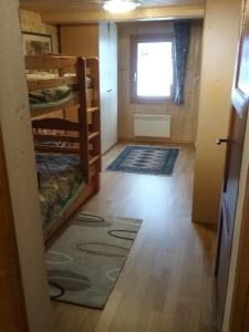 Postel nebo postele na pokoji v ubytování Walser Chalet Casa Paterna