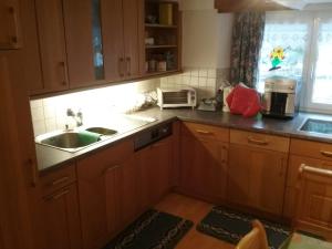 Kuchyň nebo kuchyňský kout v ubytování Walser Chalet Casa Paterna