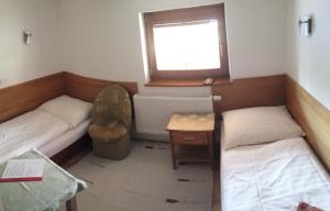 Una cama o camas en una habitación de Privát 200