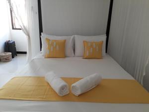 Postel nebo postele na pokoji v ubytování Apna Homestay Apartments
