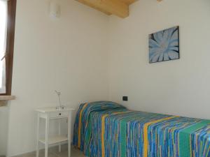 Postel nebo postele na pokoji v ubytování B&B Corte Preare