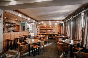 Restoran või mõni muu söögikoht majutusasutuses Alpine Lounge Boutique Hotel