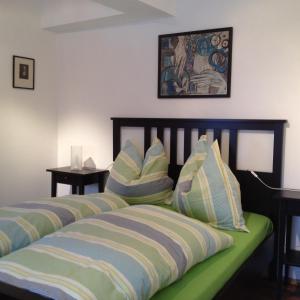 En eller flere senge i et værelse på Haus Tischler Ferienwohnungen