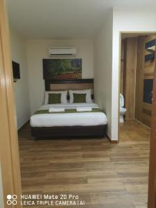 Postel nebo postele na pokoji v ubytování Yeob Bay hotel Ampang