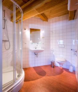 a bathroom with a sink and a toilet at Molen Hunsingo in Onderdendam