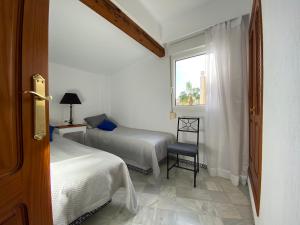 Posteľ alebo postele v izbe v ubytovaní Apartamento Tranquilo, Aldea del Mar
