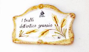 Certifikát, ocenenie alebo iný dokument vystavený v ubytovaní I Trulli Di Nonno Giovanni