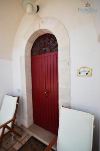Fotografia z galérie ubytovania I Trulli Di Nonno Giovanni v destinácii Martina Franca