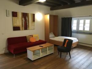 Postel nebo postele na pokoji v ubytování Jugendstilhotel Trifels