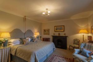 A bed or beds in a room at Glenapp Castle 