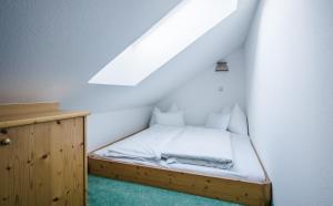 Postel nebo postele na pokoji v ubytování Hotel Sonnenheim
