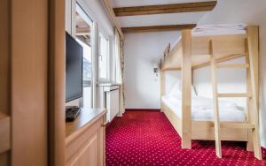 Postel nebo postele na pokoji v ubytování Hotel Sonnenheim