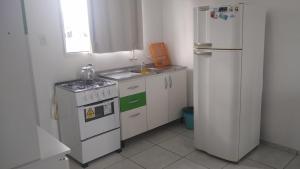 Кухня или мини-кухня в Pousada Emanuel
