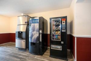 two vending machines are sitting next to each other at Red Roof Inn Lumberton in Lumberton