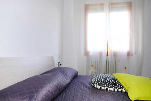 A bed or beds in a room at La Casina di Certaldo