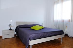 A bed or beds in a room at La Casina di Certaldo