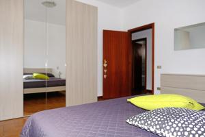 A bed or beds in a room at La Casina di Certaldo