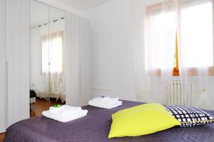 A bed or beds in a room at La Casina di Certaldo