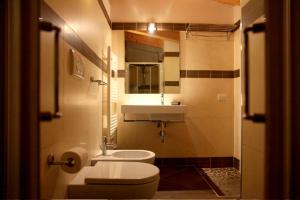 Koupelna v ubytování Residence Ilario Suite Hotel
