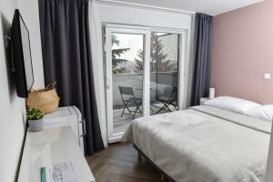 Rooms at Zajčeva 34客房内的一张或多张床位