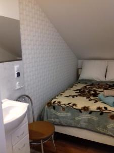 Posteľ alebo postele v izbe v ubytovaní Homestay Stróżówka
