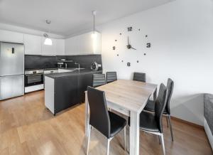 Kuchyňa alebo kuchynka v ubytovaní Apartmán Benedikt - soukromá zahrádka