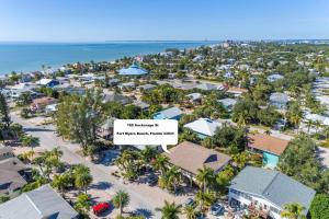an aerial view of the resort with a sign that reads the pineapple island resort at #1 Island Hideaway PICK ME!!! in Fort Myers Beach