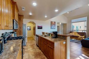 a kitchen with a sink and a counter top at Rim Vista 11A2 in Moab
