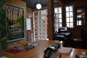 Televiisor ja/või meelelahutuskeskus majutusasutuses Hostal Valle Mistral