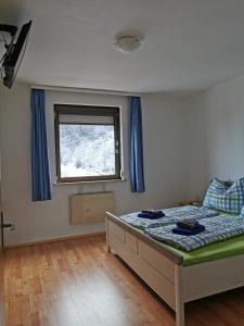 Postel nebo postele na pokoji v ubytování Ferienwohnung - Apartment Pichlarn Irdning