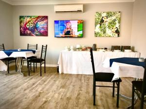 Restaurant o un lloc per menjar a Marco Polo Motor Inn Taree