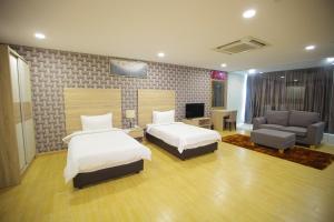Krevet ili kreveti u jedinici u objektu D Gateway Perdana Hotel Bangi