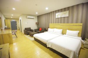 D Gateway Perdana Hotel Bangi客房内的一张或多张床位
