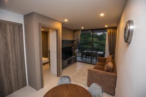 TV a/nebo společenská místnost v ubytování Beachfront Condo Escape 243