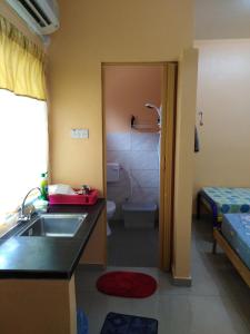 Letto o letti in una camera di Homestay Teratak Umi Klang