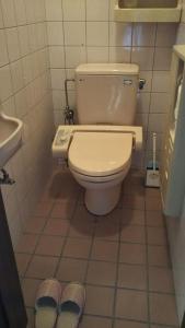 Koupelna v ubytování 町中ステイ 宗ハウス