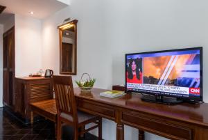 TV a/nebo společenská místnost v ubytování Kingdom Angkor Hotel