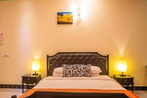 Charming Holiday Lodge tesisinde bir odada yatak veya yataklar
